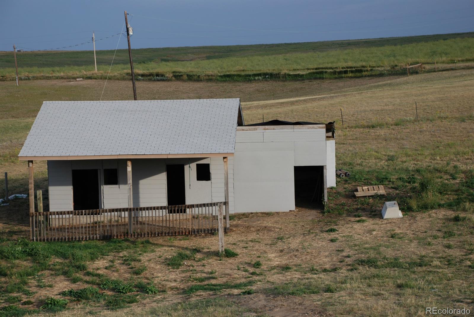 8979 Lariat Loop Elizabeth, CO 80107 - Photo 17 of 17 front view of a house with a yard