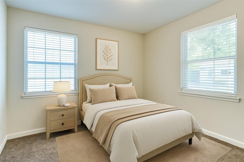 4312 Ridgedale Drive Mesquite, TX 75150 - Photo 11 of 23 a bedroom with a bed and a window