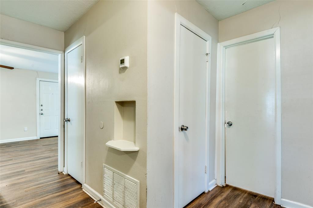 4312 Ridgedale Drive Mesquite, TX 75150 - Photo 16 of 23 a view of a bathroom from a hallway
