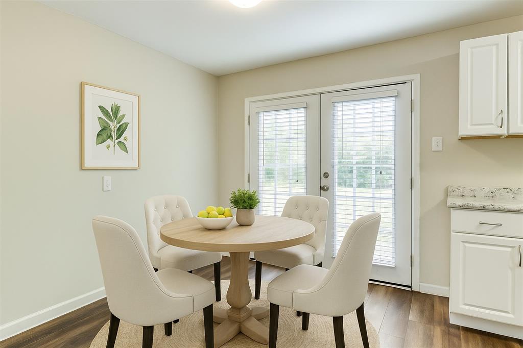 4312 Ridgedale Drive Mesquite, TX 75150 - Photo 3 of 23 a view of a dining room with furniture window and wooden floor