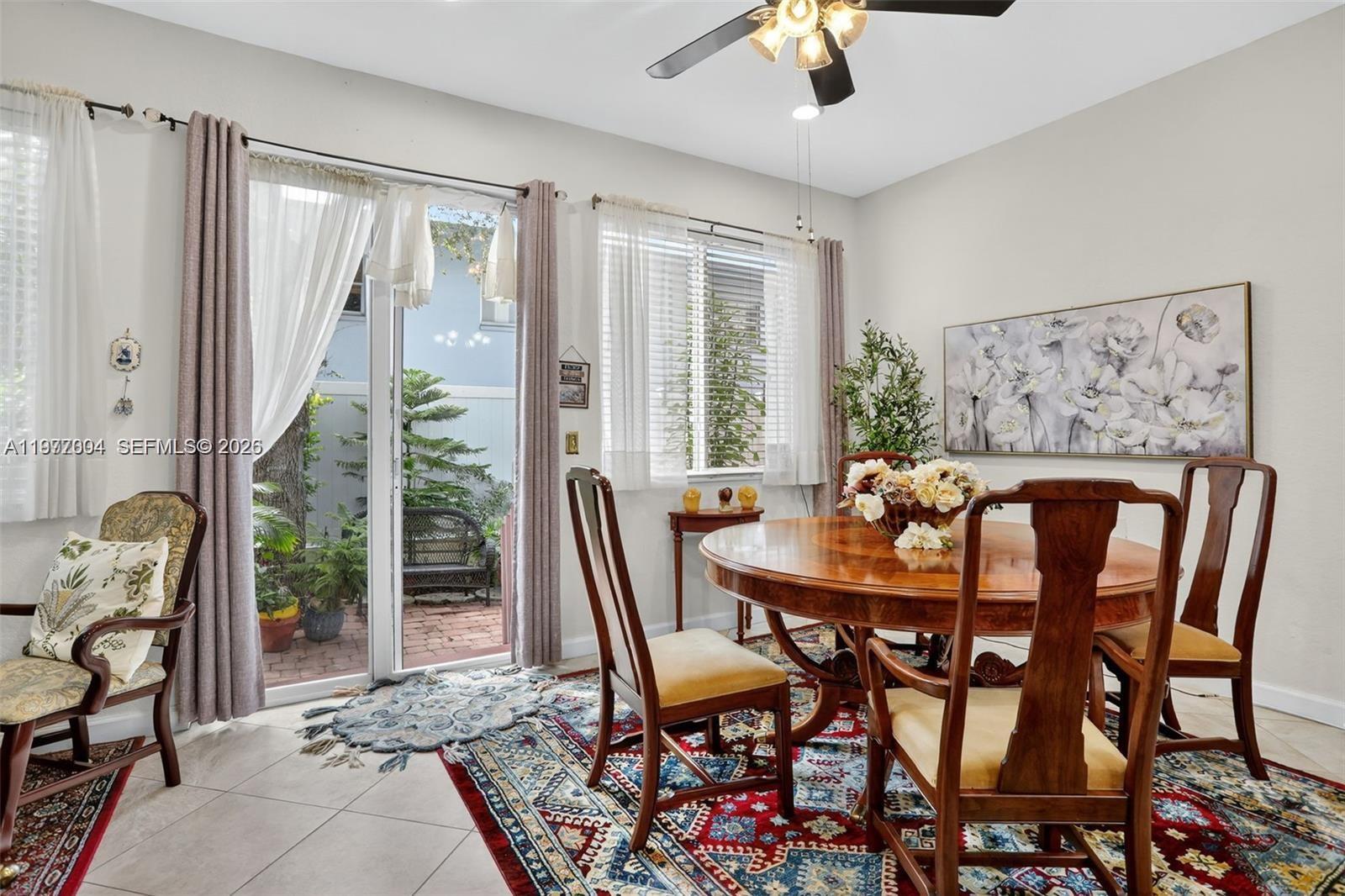 728 Southeast 2nd Street Pompano Beach, FL 33060 - Photo 4 of 22 a view of a dining room with furniture window and outside view