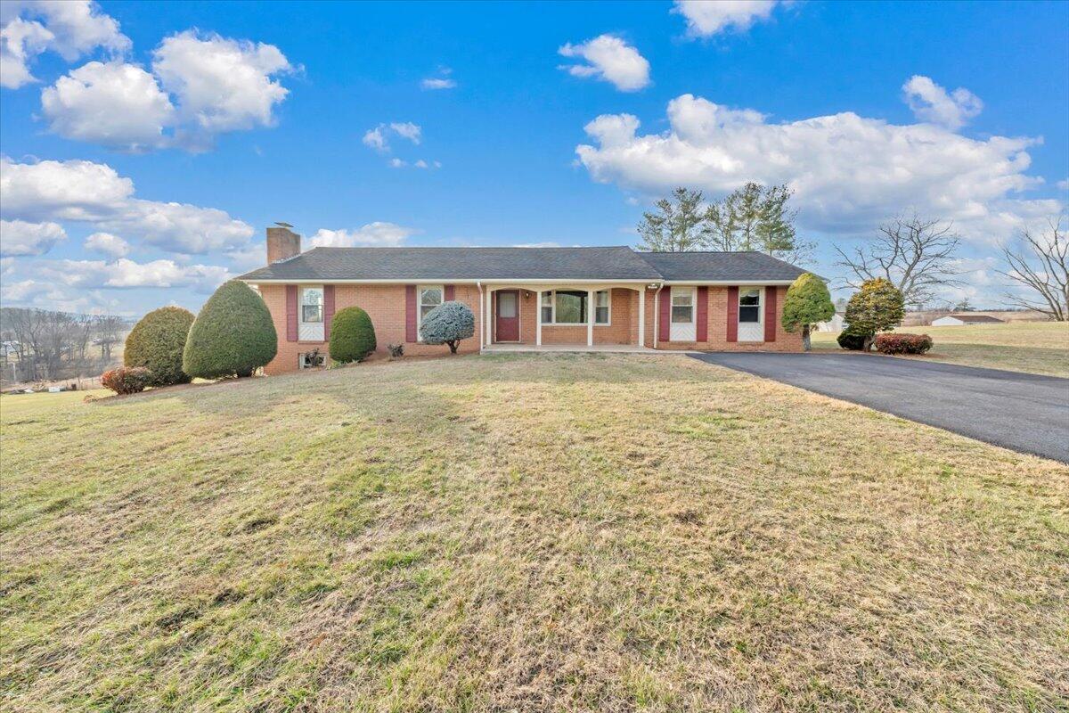 5985 Collier Street Dublin, VA 24084 - Photo 15 of 53 a view of a house with a patio