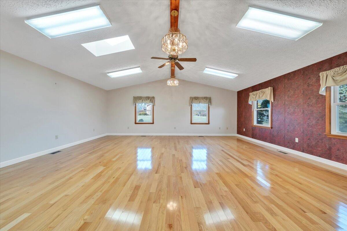 5985 Collier Street Dublin, VA 24084 - Photo 20 of 53 a view of empty room with wooden floor and fan