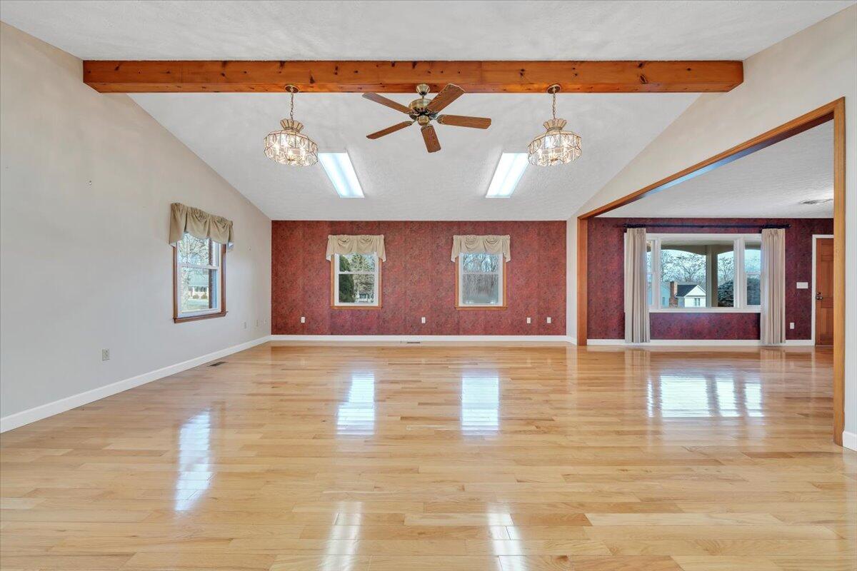 5985 Collier Street Dublin, VA 24084 - Photo 21 of 53 a view of an empty room with window and wooden floor