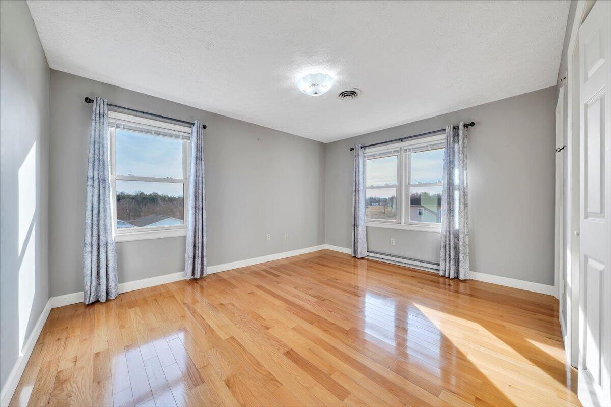 5985 Collier Street Dublin, VA 24084 - Photo 35 of 53 a view of empty room with wooden floor and fan