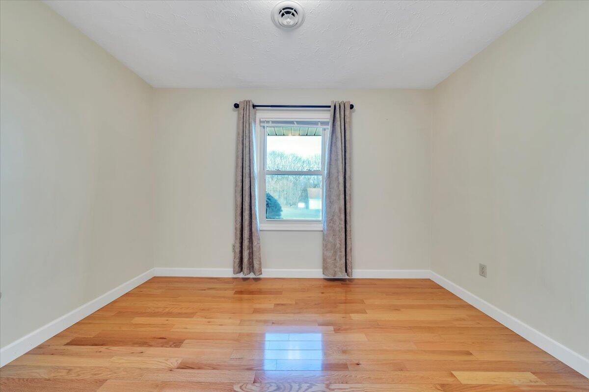 5985 Collier Street Dublin, VA 24084 - Photo 41 of 53 a view of empty room with wooden floor and fan