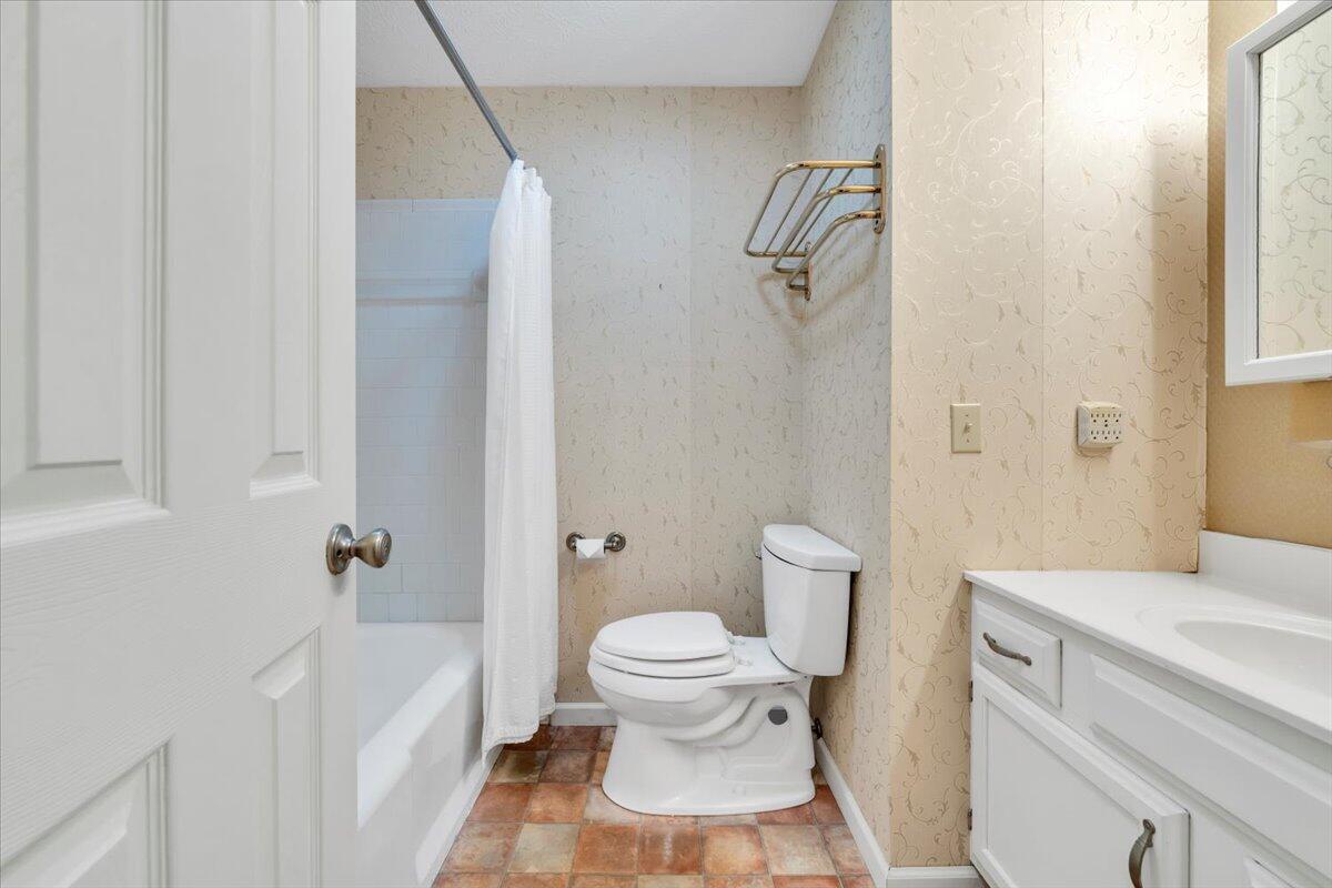 5985 Collier Street Dublin, VA 24084 - Photo 43 of 53 a bathroom with a sink a toilet and shower