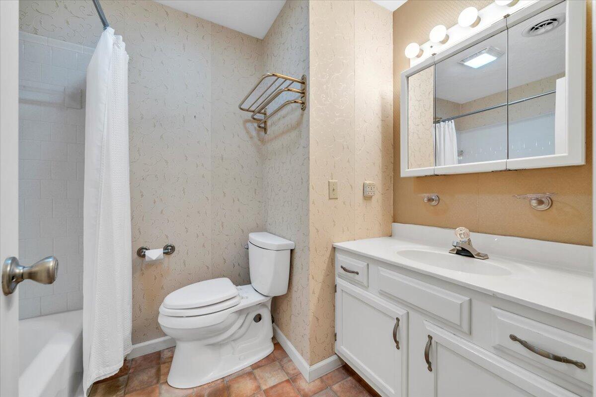 5985 Collier Street Dublin, VA 24084 - Photo 44 of 53 a bathroom with a sink toilet and shower