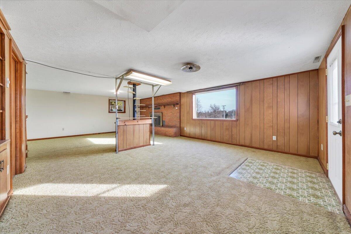 5985 Collier Street Dublin, VA 24084 - Photo 48 of 53 an empty room with a empty space and windows