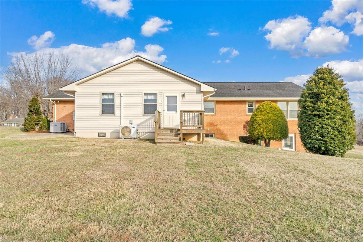 5985 Collier Street Dublin, VA 24084 - Photo 6 of 53 a view of a house with a yard