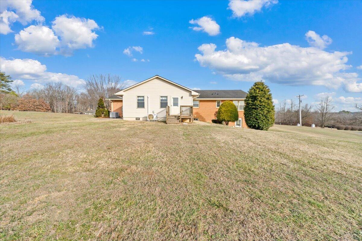 5985 Collier Street Dublin, VA 24084 - Photo 7 of 53 a view of a house with a yard