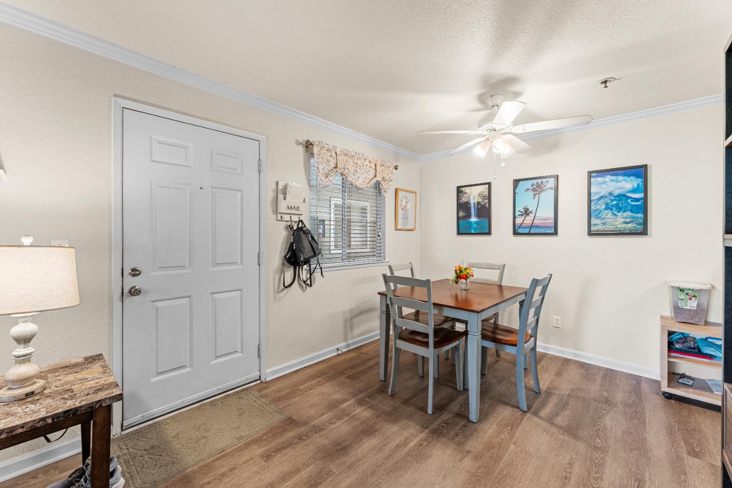 1019 Dornajo Way, Unit 123 Sacramento, CA 95825 - Photo 11 of 23 a view of a dining room with furniture and wooden floor
