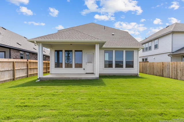 a view of a backyard with a garden