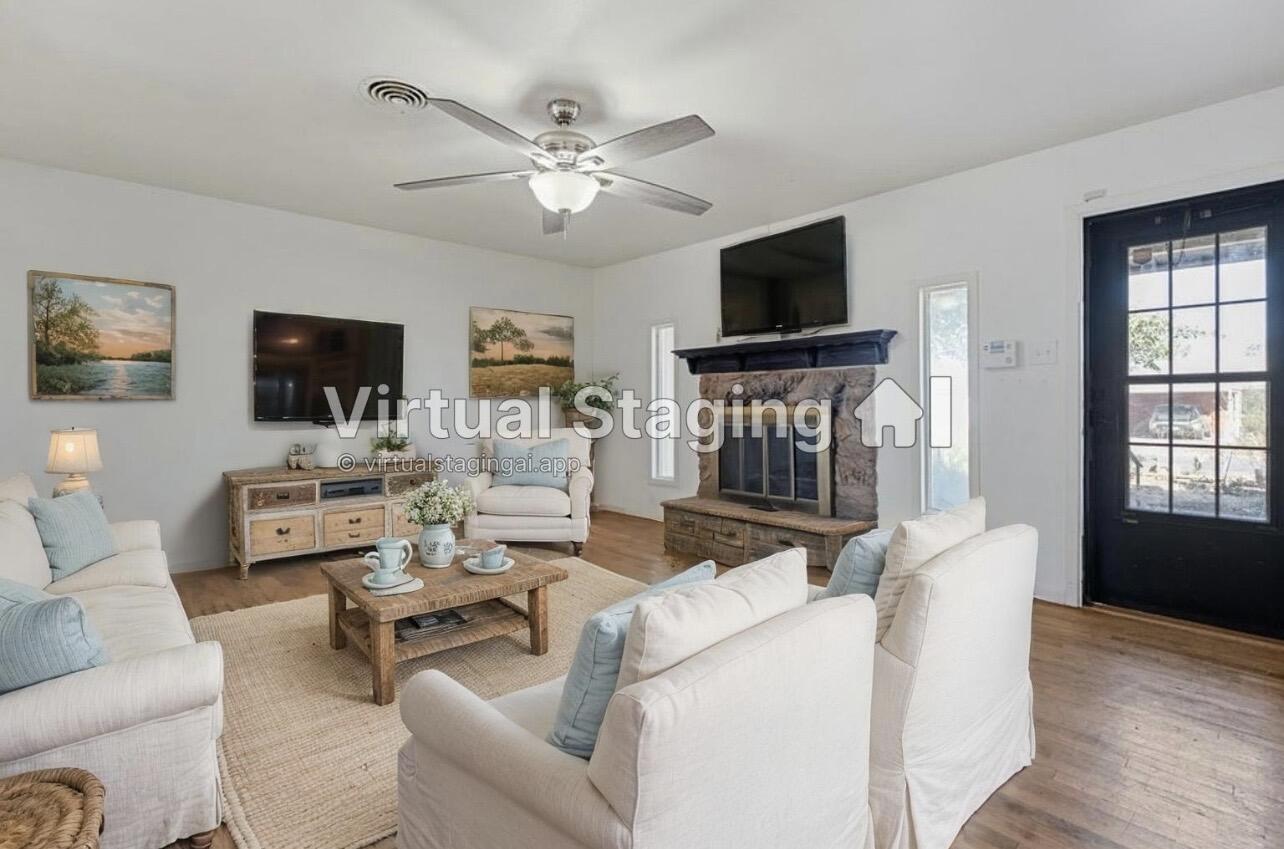 705 6th Street Wolfforth, TX 79382 - Photo 5 of 29 a living room with furniture and a flat screen tv