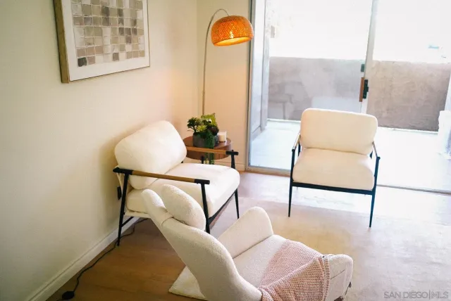 a view of a workspace and a window in a room