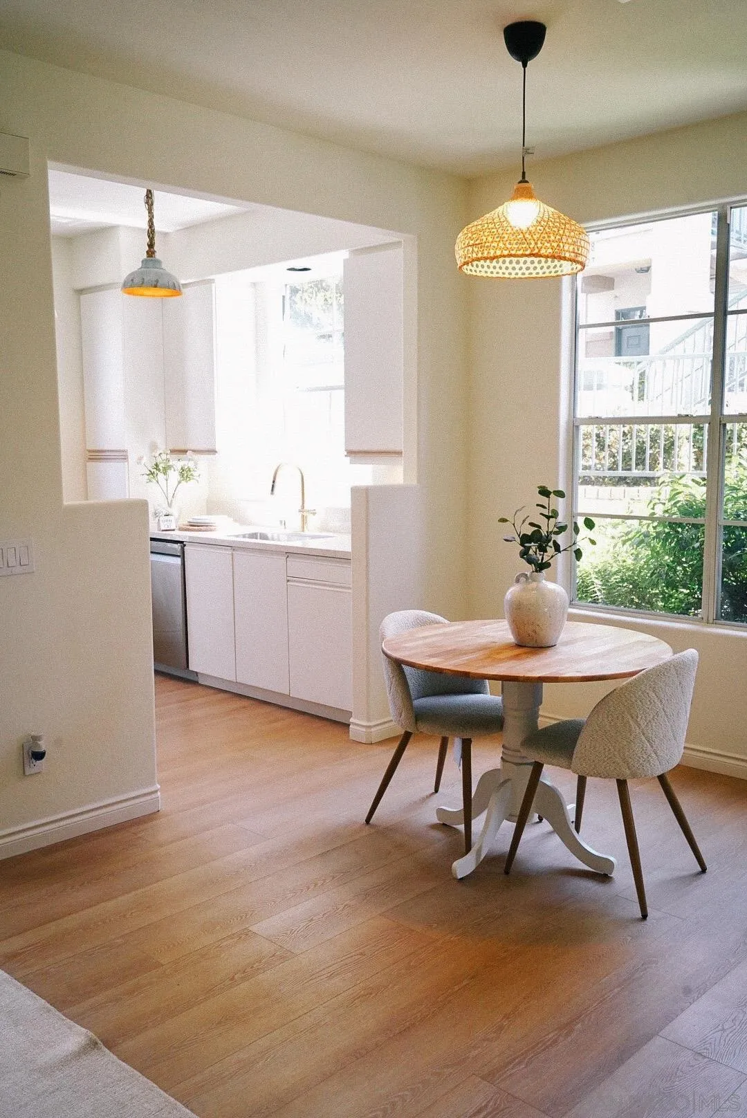 3537 Caminito El Rincon, Unit 259 San Diego, CA 92130 - Photo 20 of 59 a view of a dining room with furniture window and wooden floor