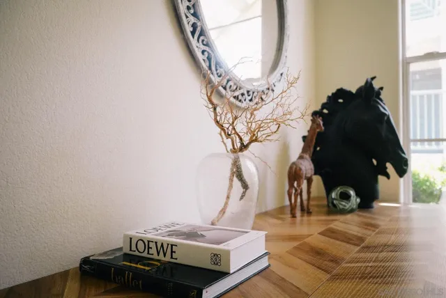 a bedroom with a bed and lamp