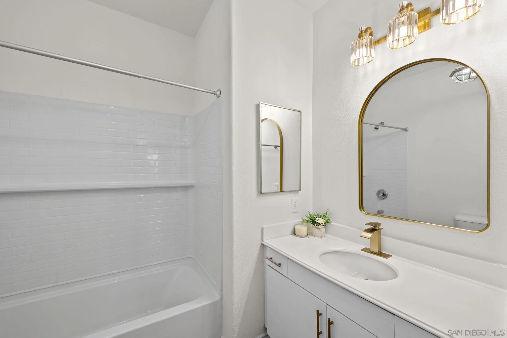 3537 Caminito El Rincon, Unit 259 San Diego, CA 92130 - Photo 25 of 59 a bathroom with a sink and a mirror