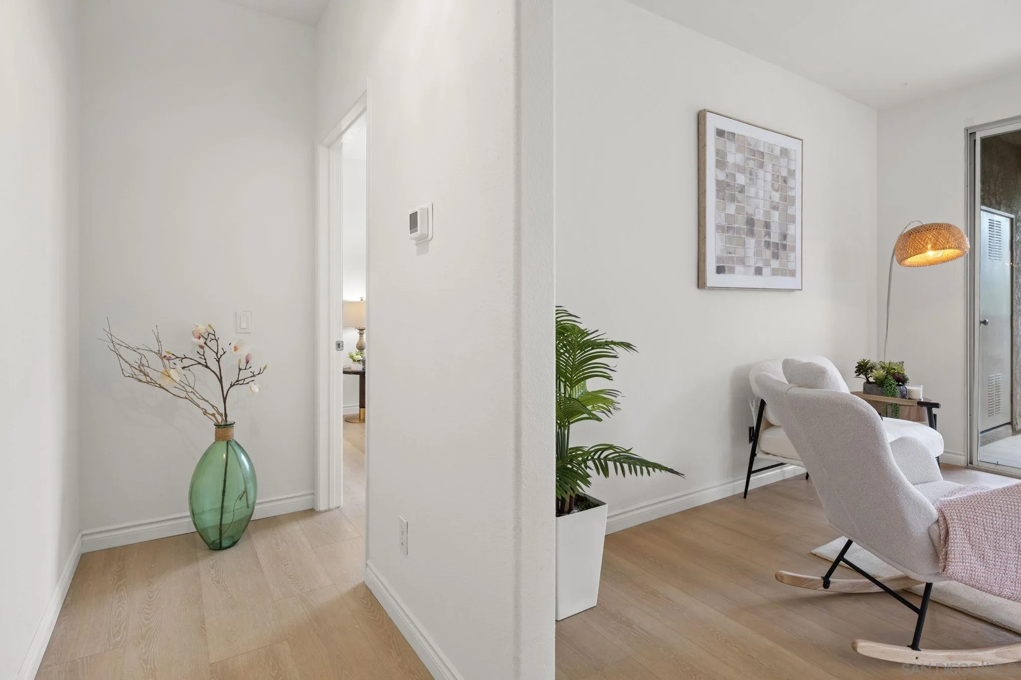 3537 Caminito El Rincon, Unit 259 San Diego, CA 92130 - Photo 27 of 59 a view of a dining area with furniture and a potted plant