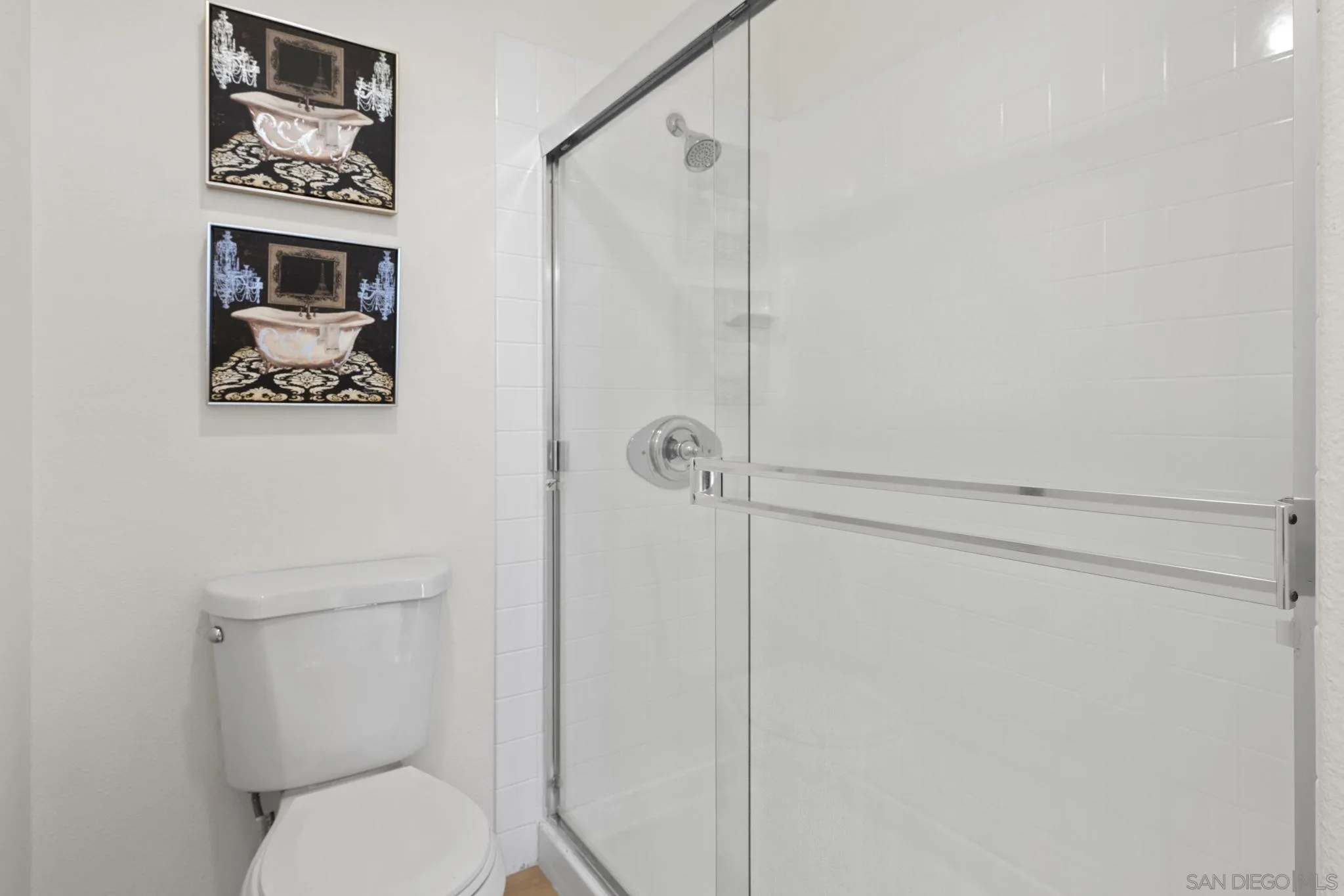 3537 Caminito El Rincon, Unit 259 San Diego, CA 92130 - Photo 33 of 59 a bathroom with a toilet and a shower