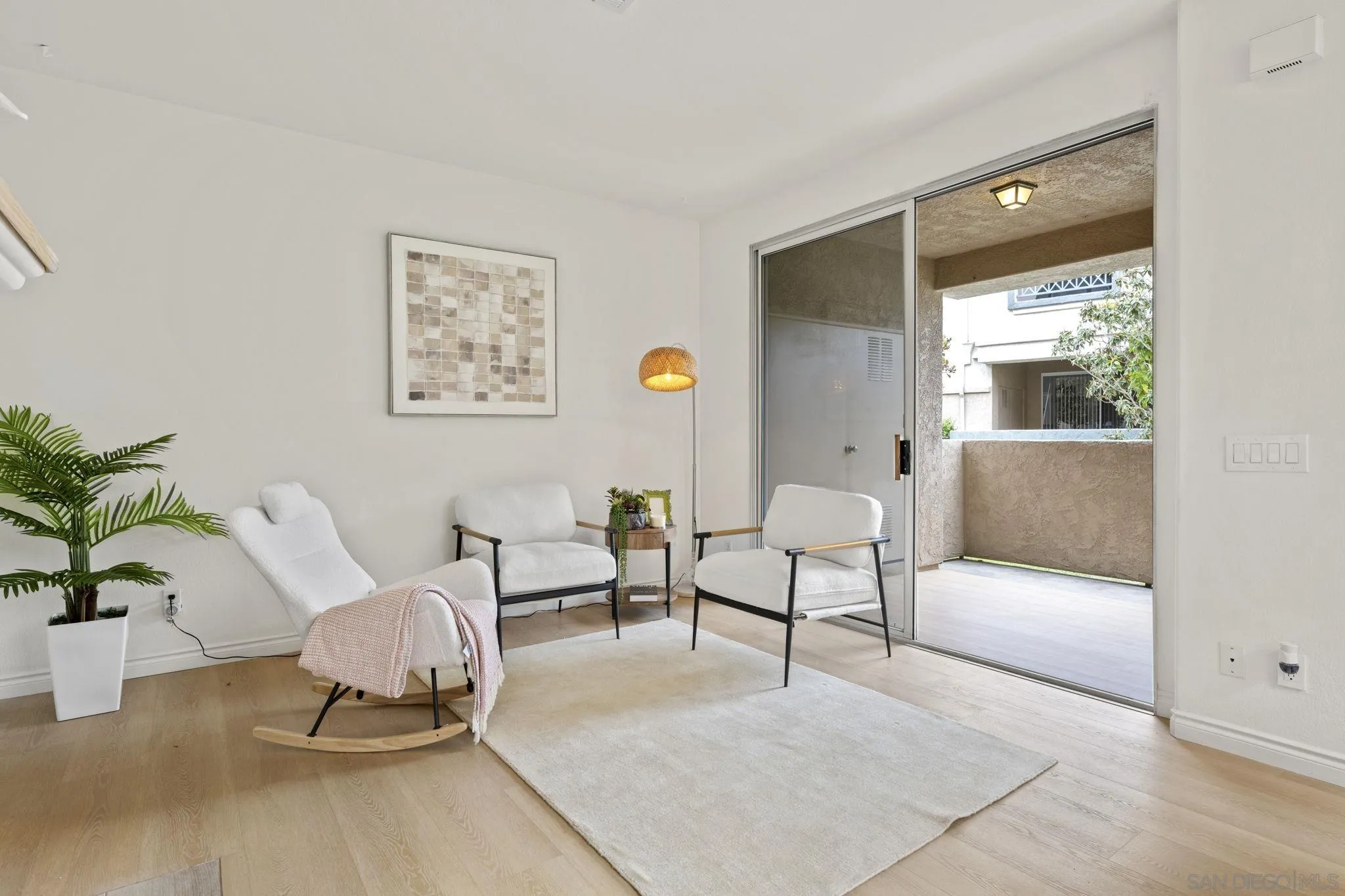 3537 Caminito El Rincon, Unit 259 San Diego, CA 92130 - Photo 5 of 59 a living room with furniture and a large window