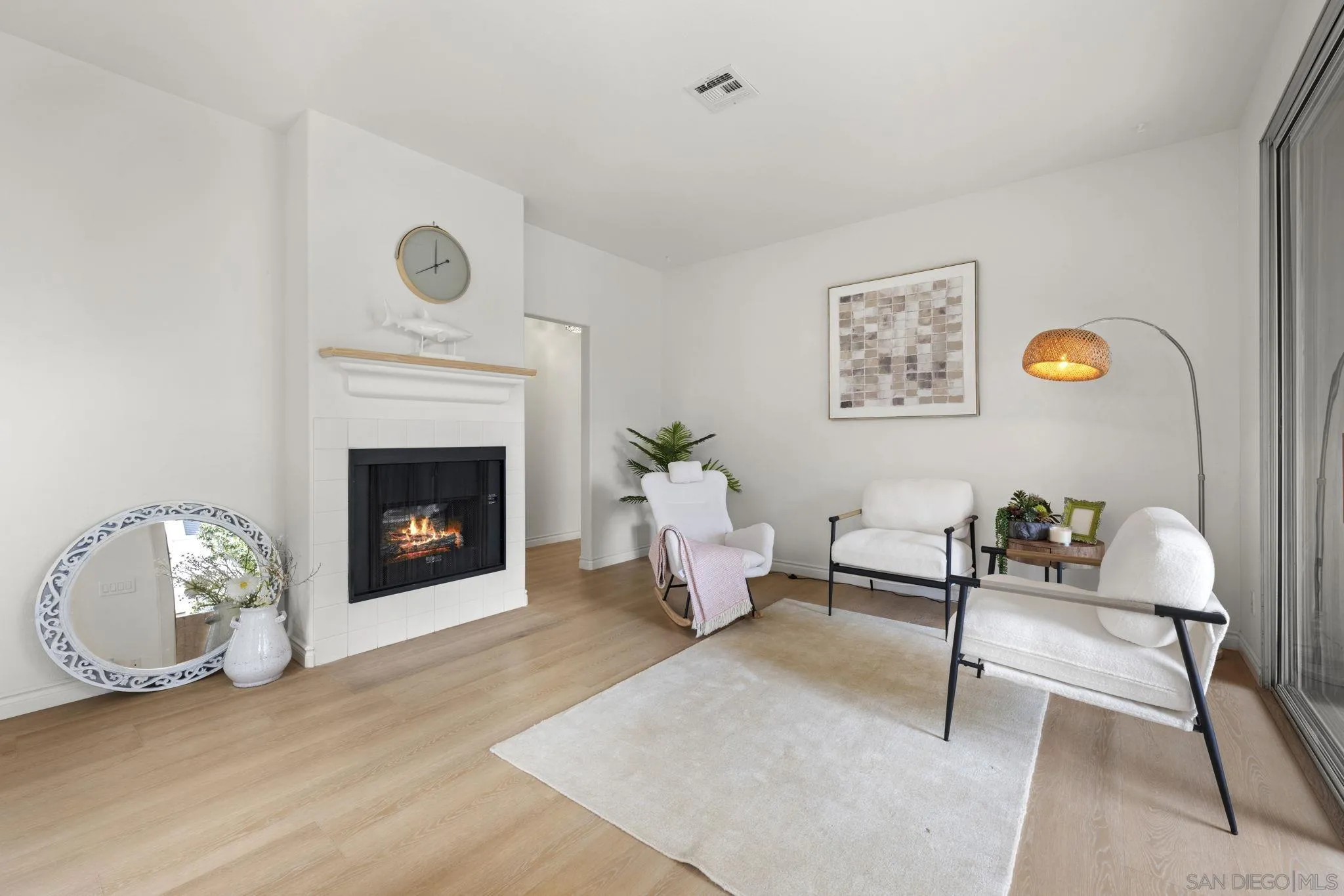 3537 Caminito El Rincon, Unit 259 San Diego, CA 92130 - Photo 6 of 59 a living room with furniture and a fireplace