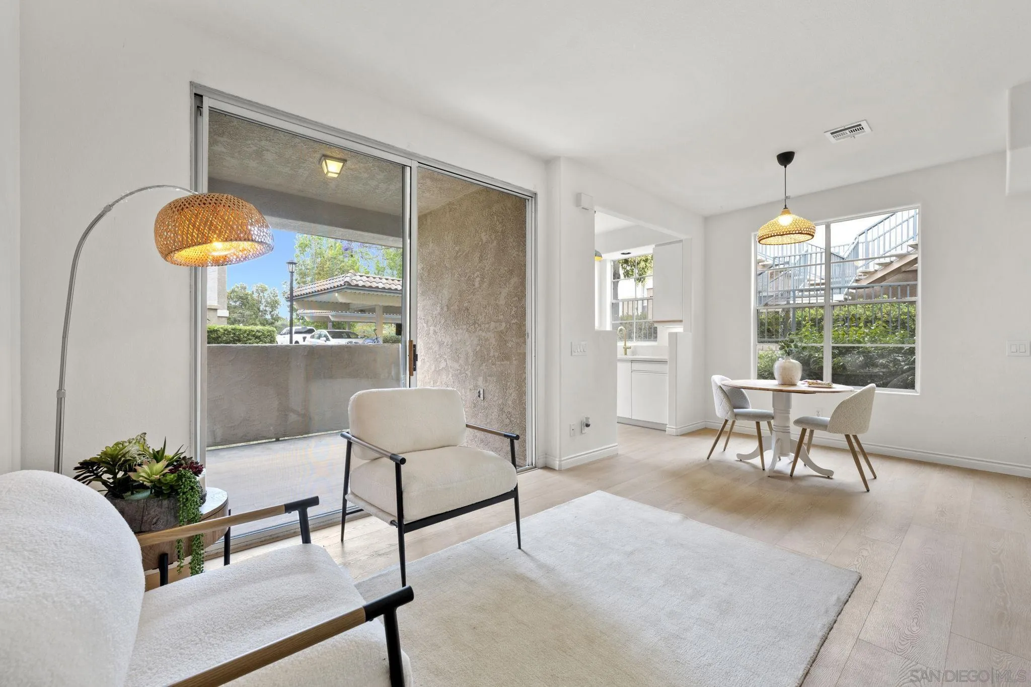 3537 Caminito El Rincon, Unit 259 San Diego, CA 92130 - Photo 7 of 59 a living room with furniture and a large window