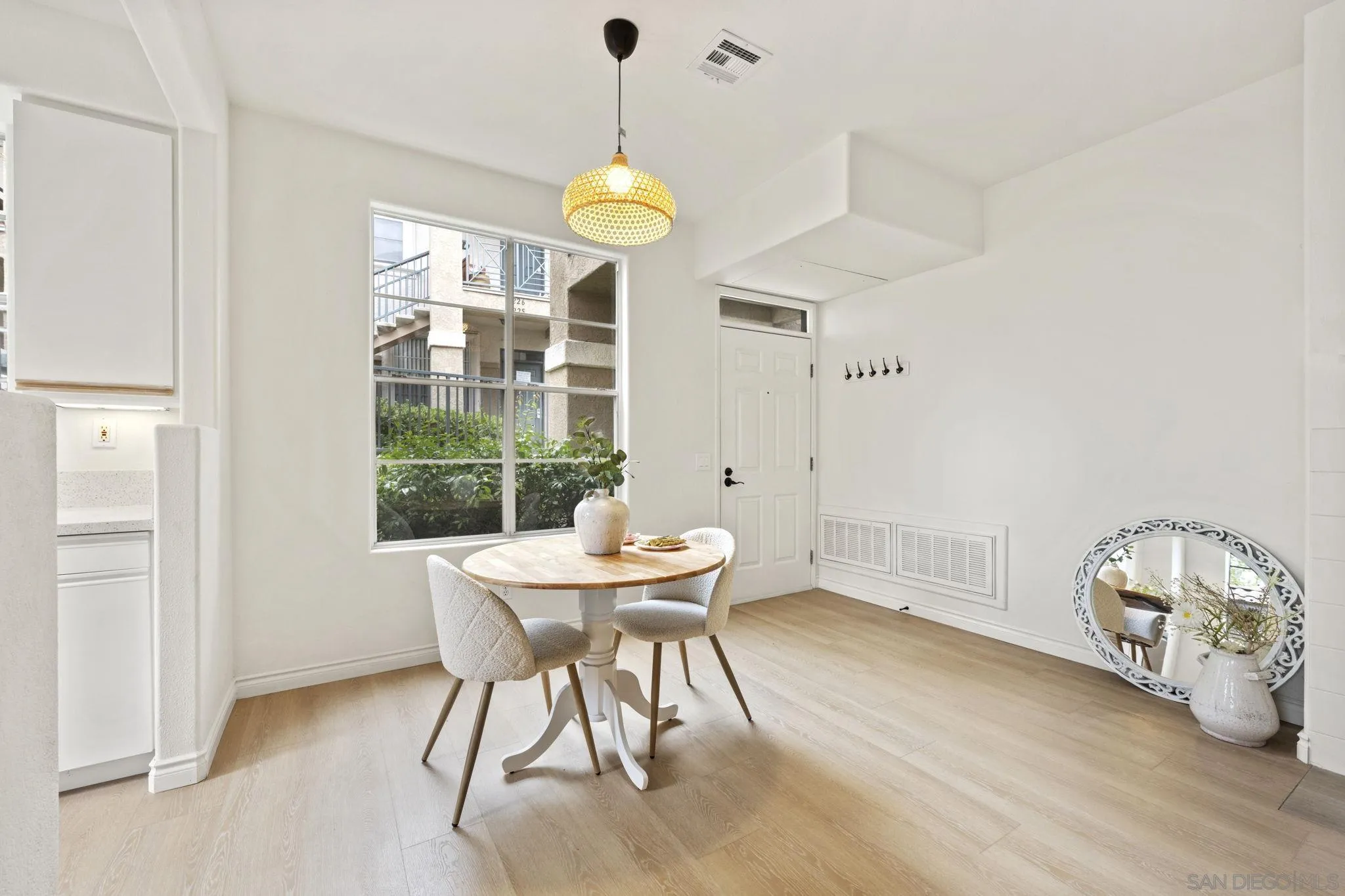 3537 Caminito El Rincon, Unit 259 San Diego, CA 92130 - Photo 8 of 59 a view of a dining room with furniture window and outside view