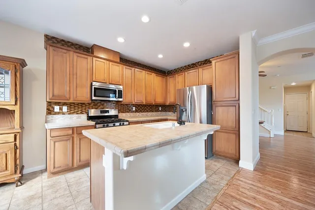 a view of backyard with large windows