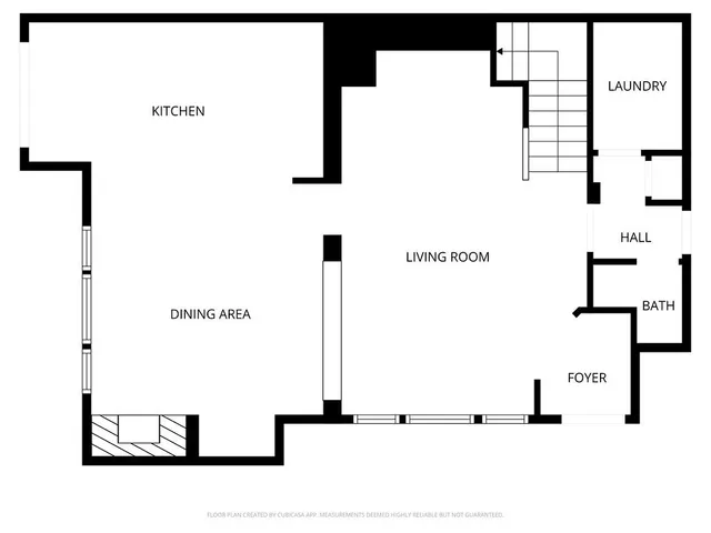 a picture of a bench in front of a window