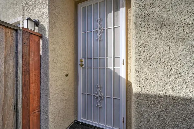 a view of a room that has a bench in it