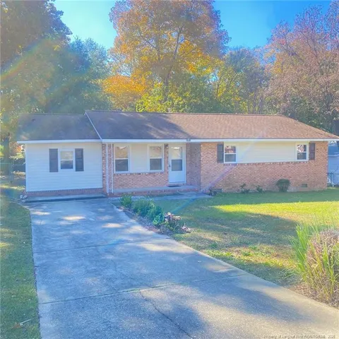 a view of outdoor space yard and front view of a house