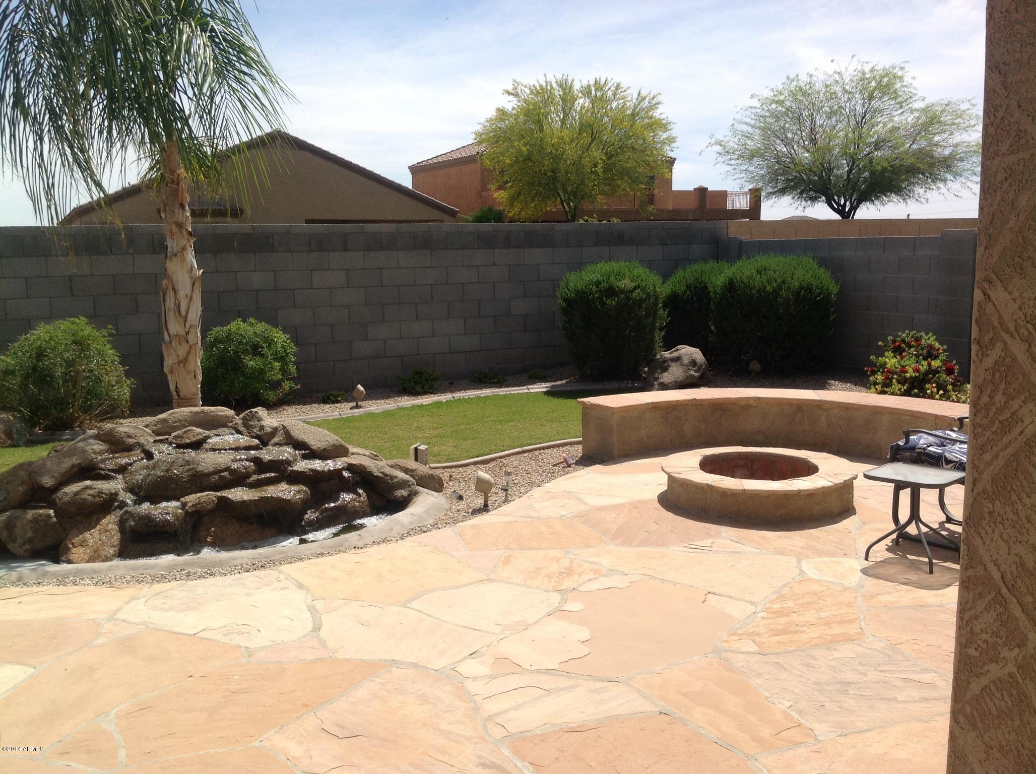 10035 Barley Road Florence, AZ 85132 - Photo 29 of 37 Waterfall and Firepit