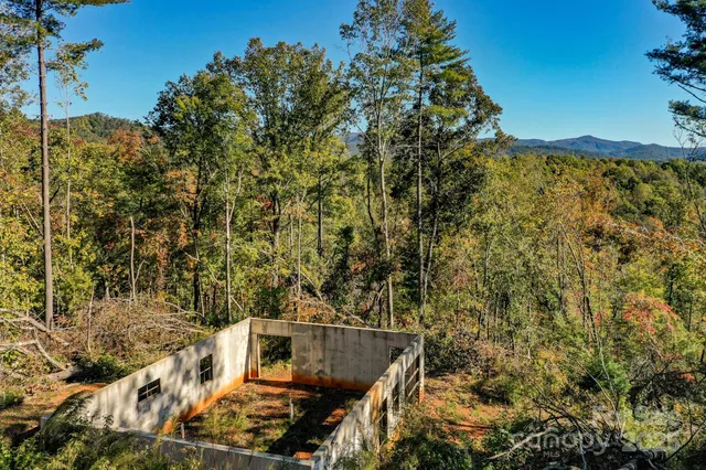 a view of a yard with table and chairs
