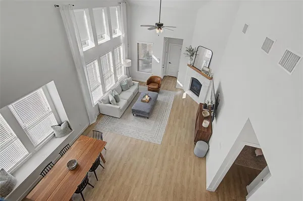 wooden floor with furniture and a stove