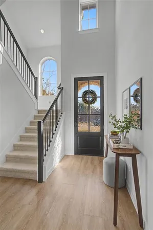 a view of entryway with livingroom