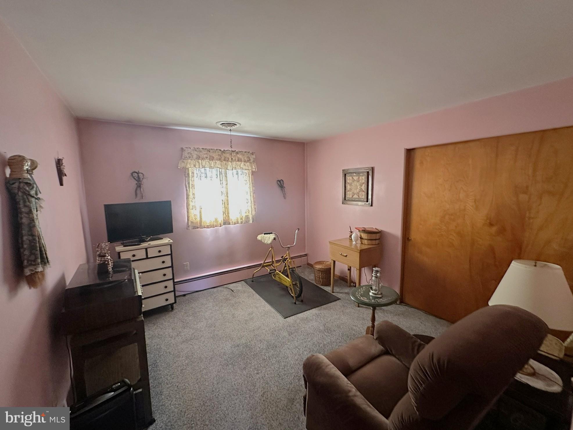 7 Glendale Street Hanover, PA 17331 - Photo 15 of 38 a living room with furniture and a flat screen tv