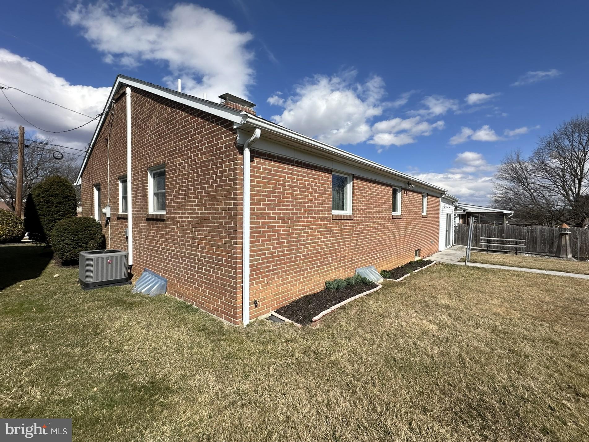 7 Glendale Street Hanover, PA 17331 - Photo 2 of 38 a backyard of a house with yard and garage