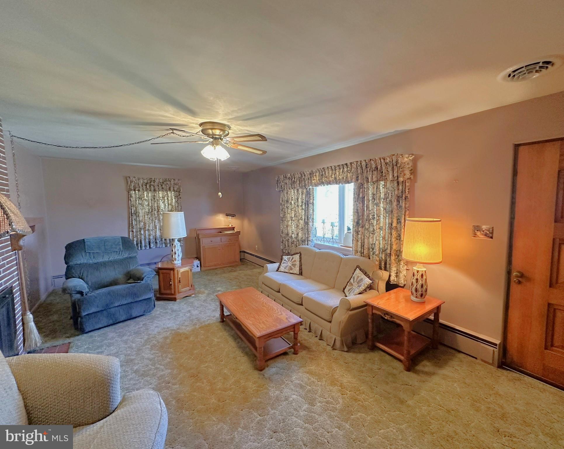 7 Glendale Street Hanover, PA 17331 - Photo 4 of 38 a living room with furniture and a chandelier