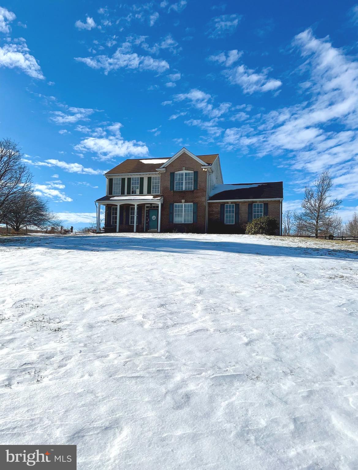 14410 Stottlemyer Road Smithsburg, MD 21783 - Photo 1 of 24 a front view of a house with a yard