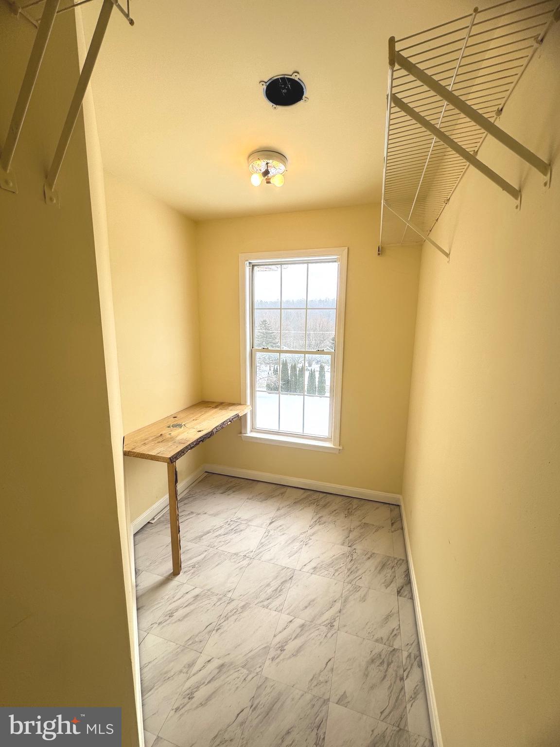14410 Stottlemyer Road Smithsburg, MD 21783 - Photo 13 of 24 a view of an empty room with a window
