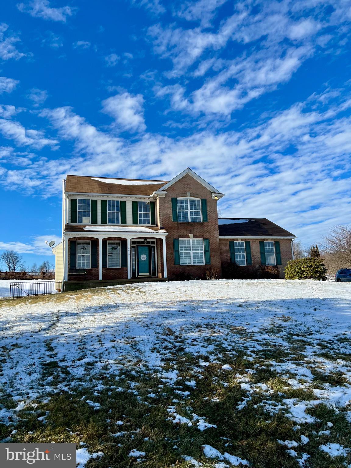 14410 Stottlemyer Road Smithsburg, MD 21783 - Photo 22 of 24 a front view of a house with a garden
