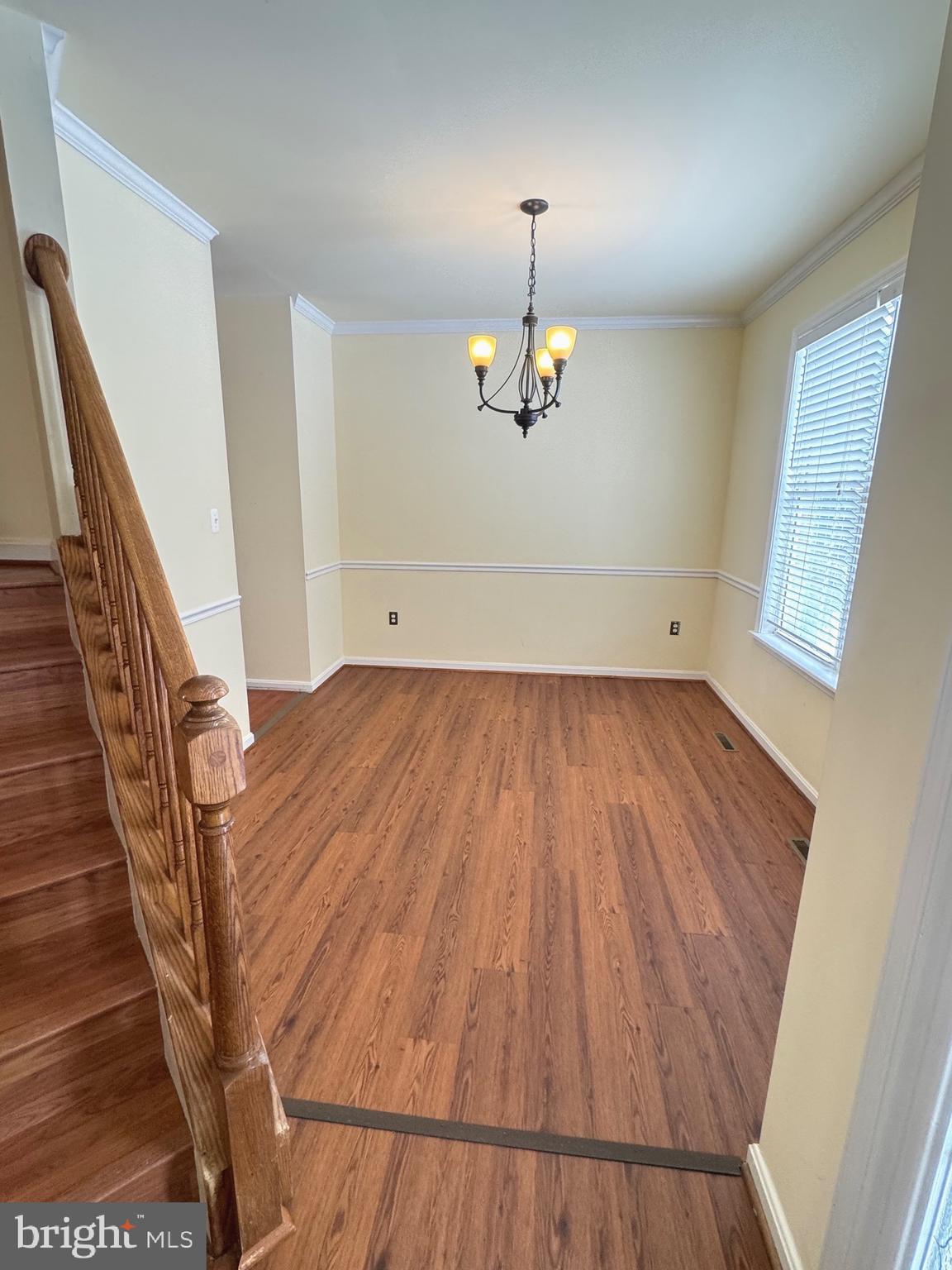 14410 Stottlemyer Road Smithsburg, MD 21783 - Photo 4 of 24 wooden floor in an empty room with a window