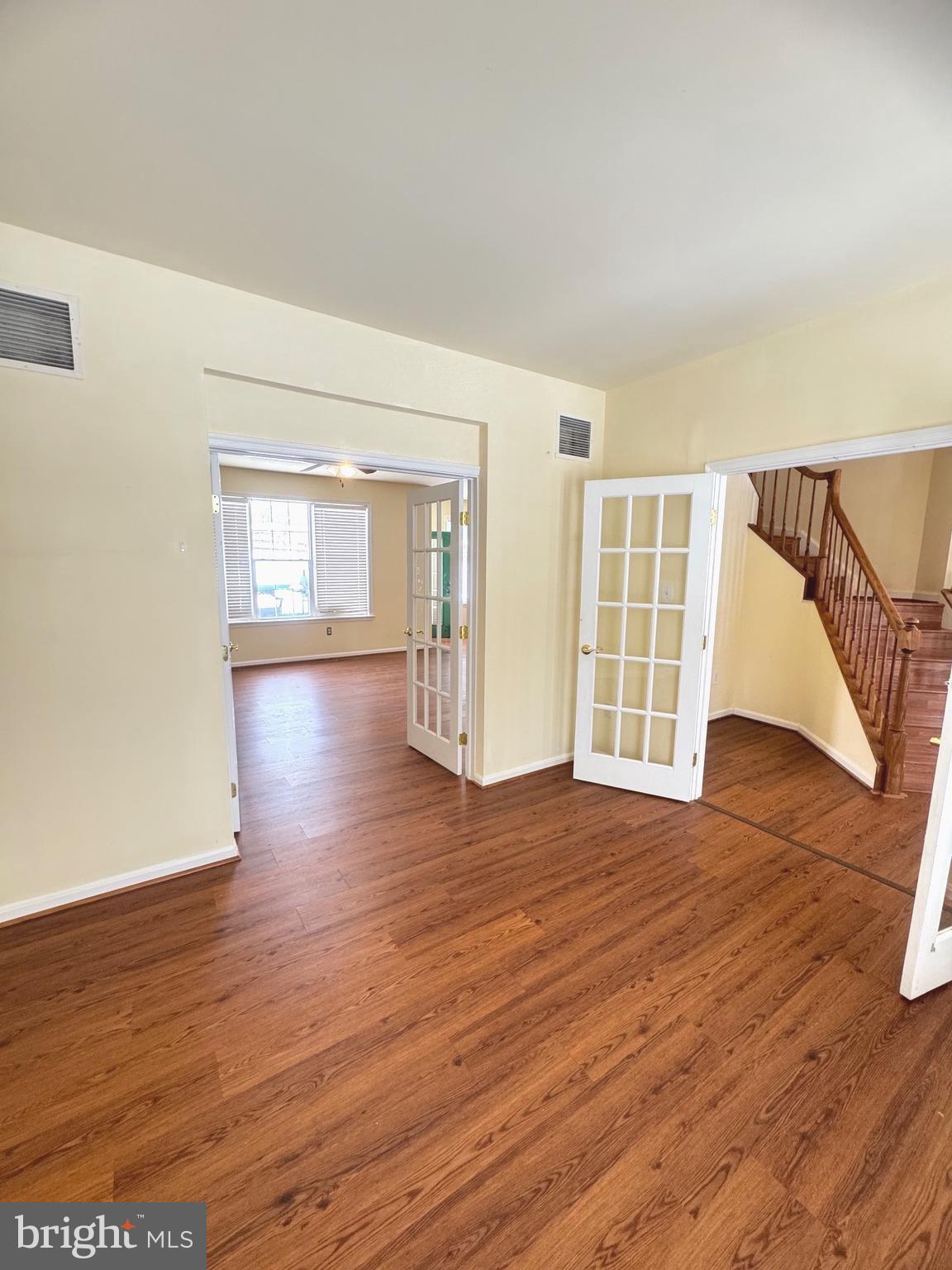 14410 Stottlemyer Road Smithsburg, MD 21783 - Photo 7 of 24 a view of empty room with wooden floor and fan