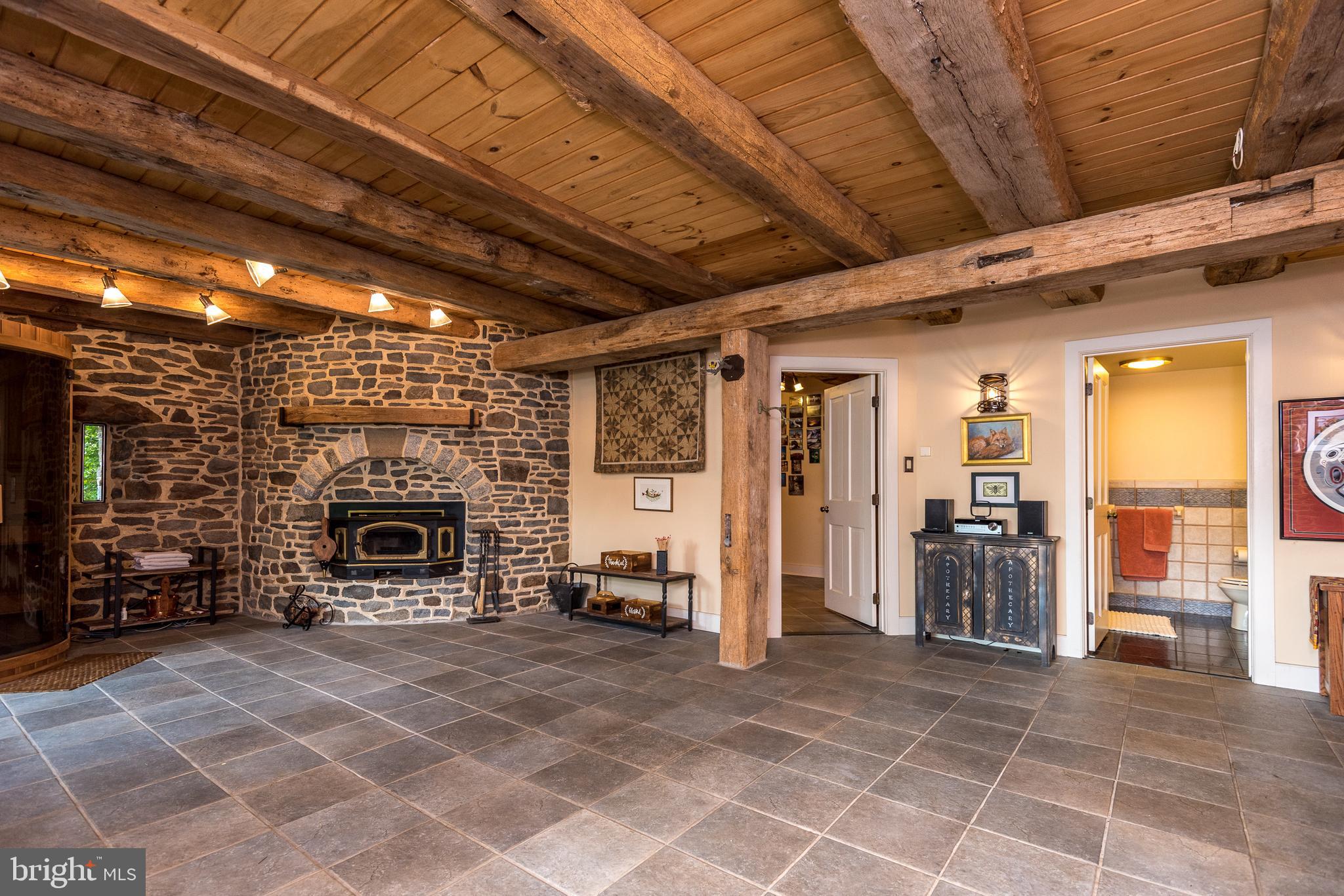 65 Reservoir Road Quakertown, PA 18951 - Photo 36 of 69 Family Room Features Tiled Floor And Wood Ceiling
