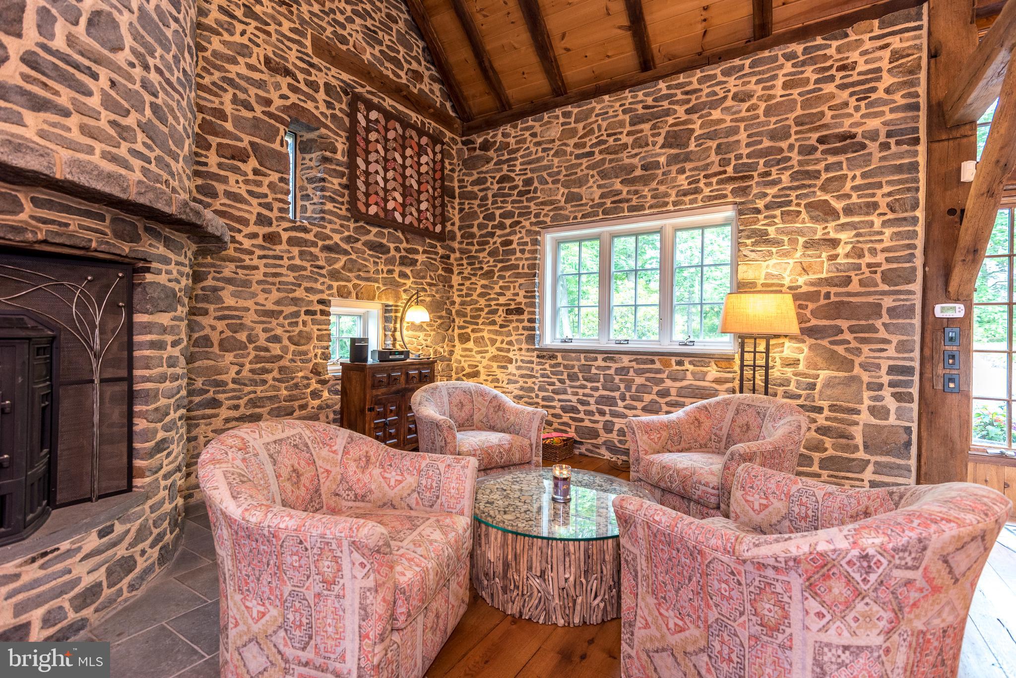 65 Reservoir Road Quakertown, PA 18951 - Photo 10 of 69 Living Room w/ Stone Walls And Vaulted Ceiling