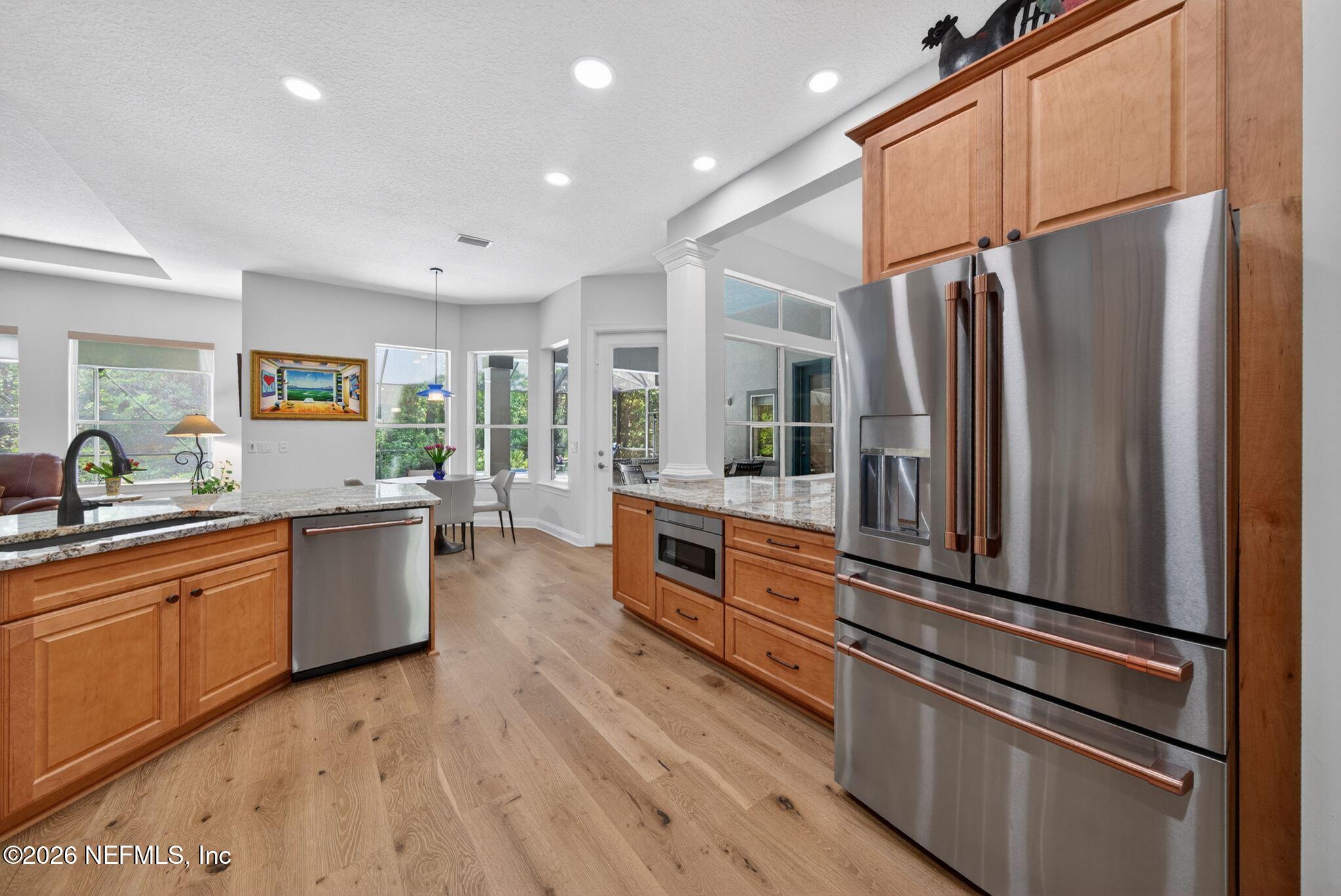 508 Sebastian Square St. Augustine, FL 32095 - Photo 18 of 76 a kitchen with stainless steel appliances a refrigerator and a sink