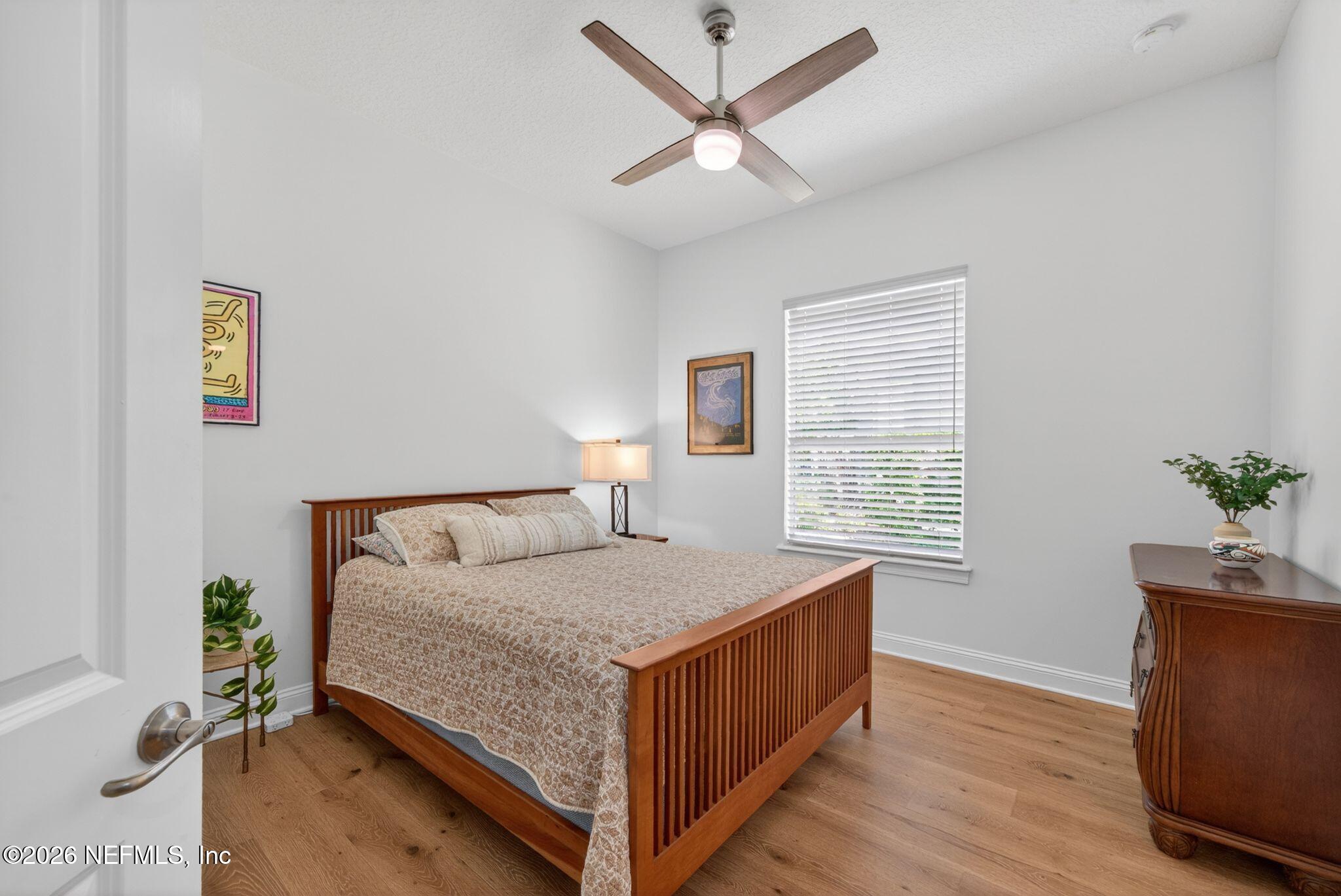 508 Sebastian Square St. Augustine, FL 32095 - Photo 31 of 76 a bedroom with a bed and a potted plant