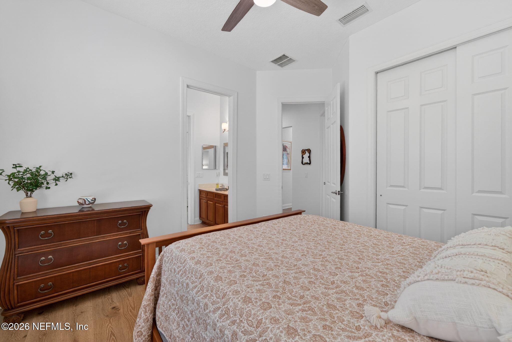 508 Sebastian Square St. Augustine, FL 32095 - Photo 32 of 76 a bedroom with a bed and a dresser
