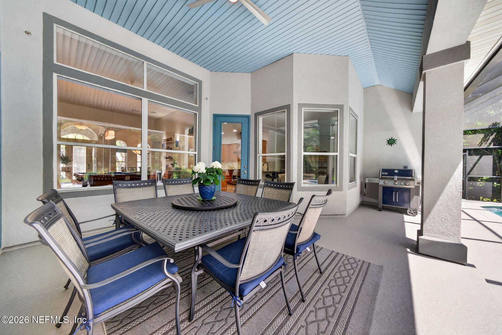 508 Sebastian Square St. Augustine, FL 32095 - Photo 45 of 76 a dining room with furniture and wooden floor